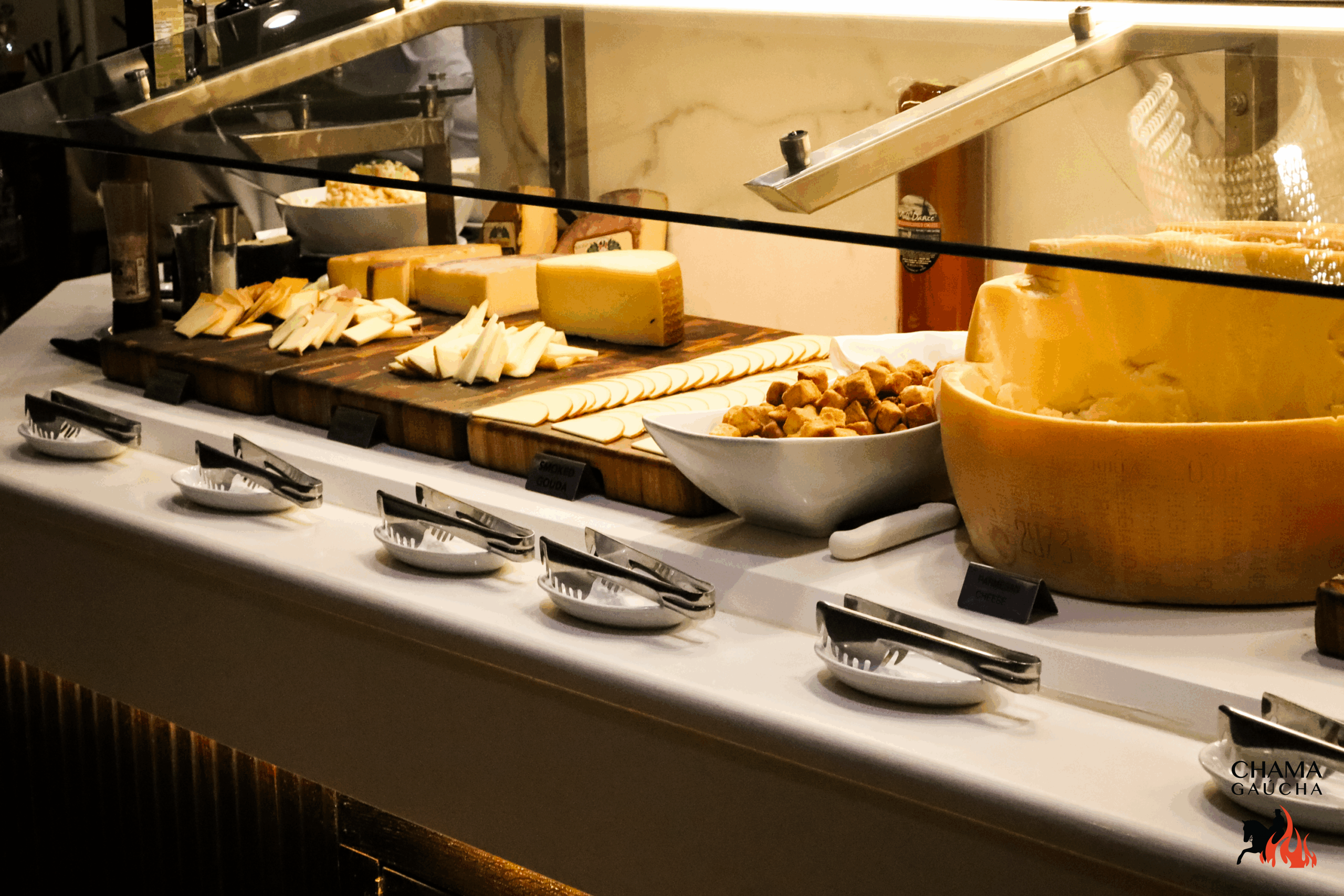 Imported cheeses at Chama Gaucha gourmet salad bar