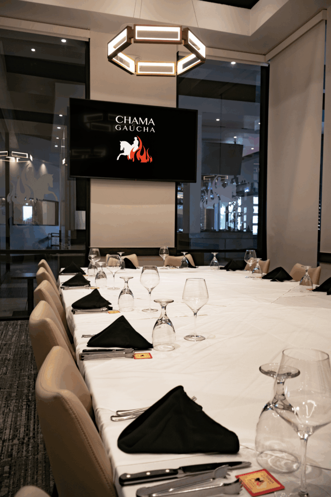 Private dining room at Chama Gaucha Brazilian steakhouse set for an elegant event